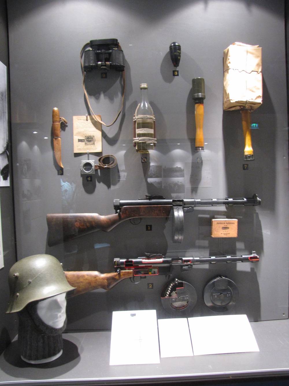 Military field gear and equipment laid out for inspection